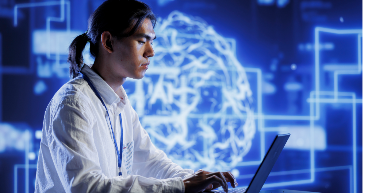 Data Scientist working on a laptop in lab surrounded by data